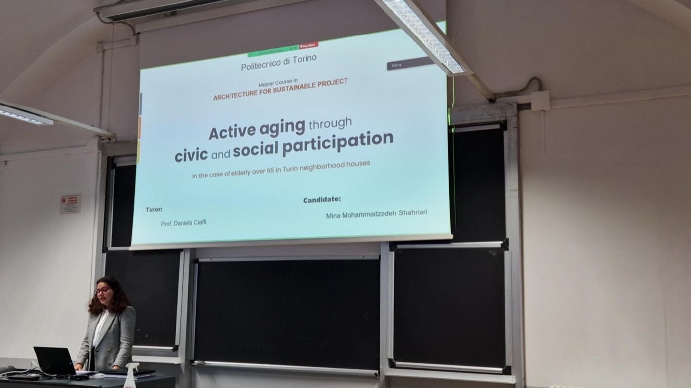 Mina presenting her master's thesis defense